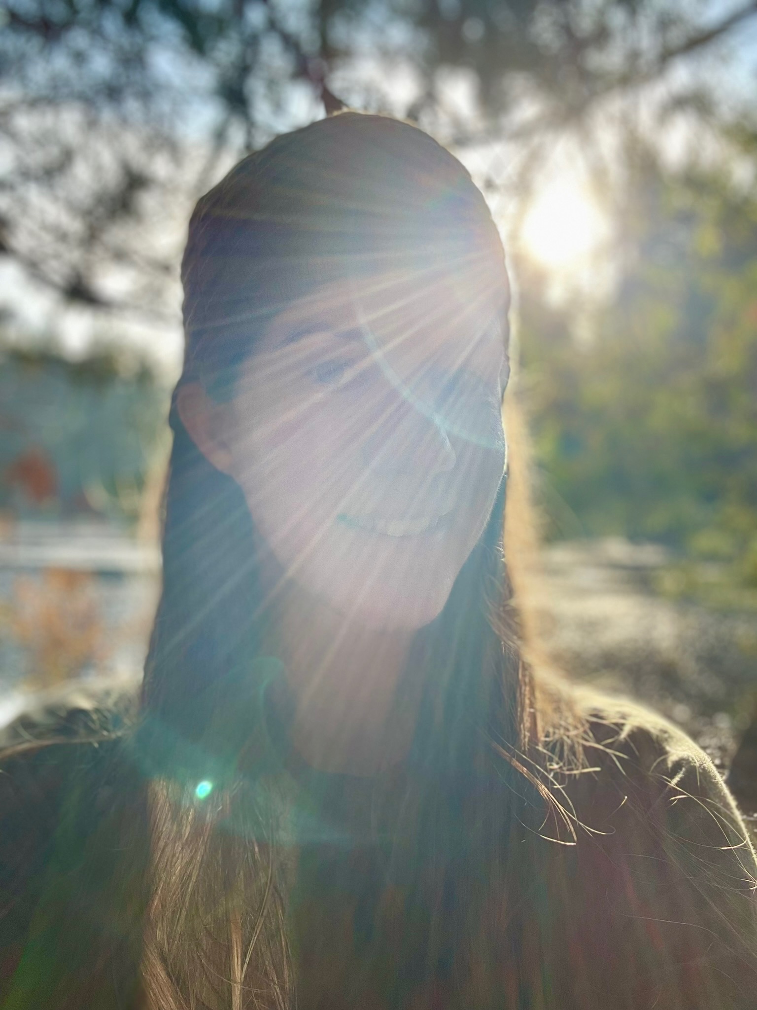 Cassandra Beaumont outdoors in warm afternoon sunlight